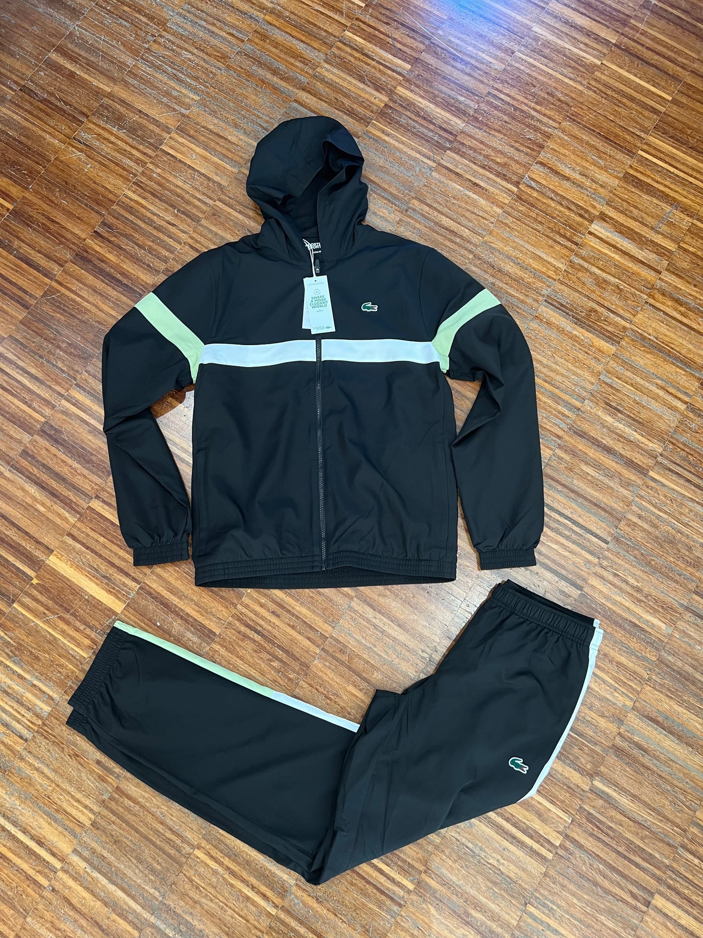 tuta Lacoste microfibra