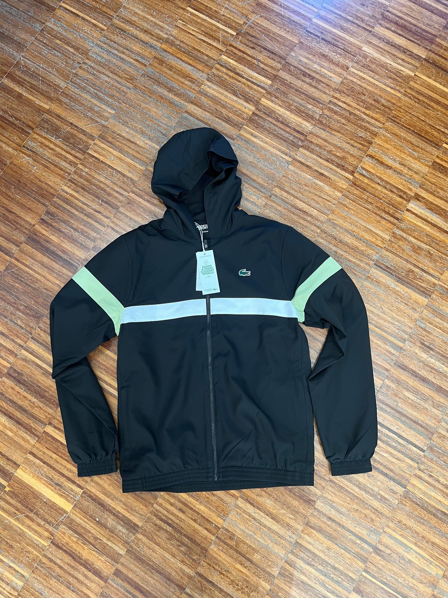 tuta Lacoste microfibra