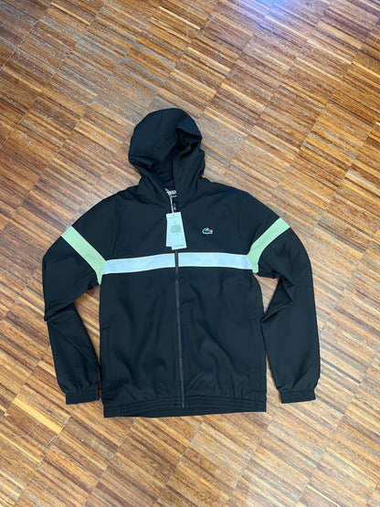 tuta Lacoste microfibra