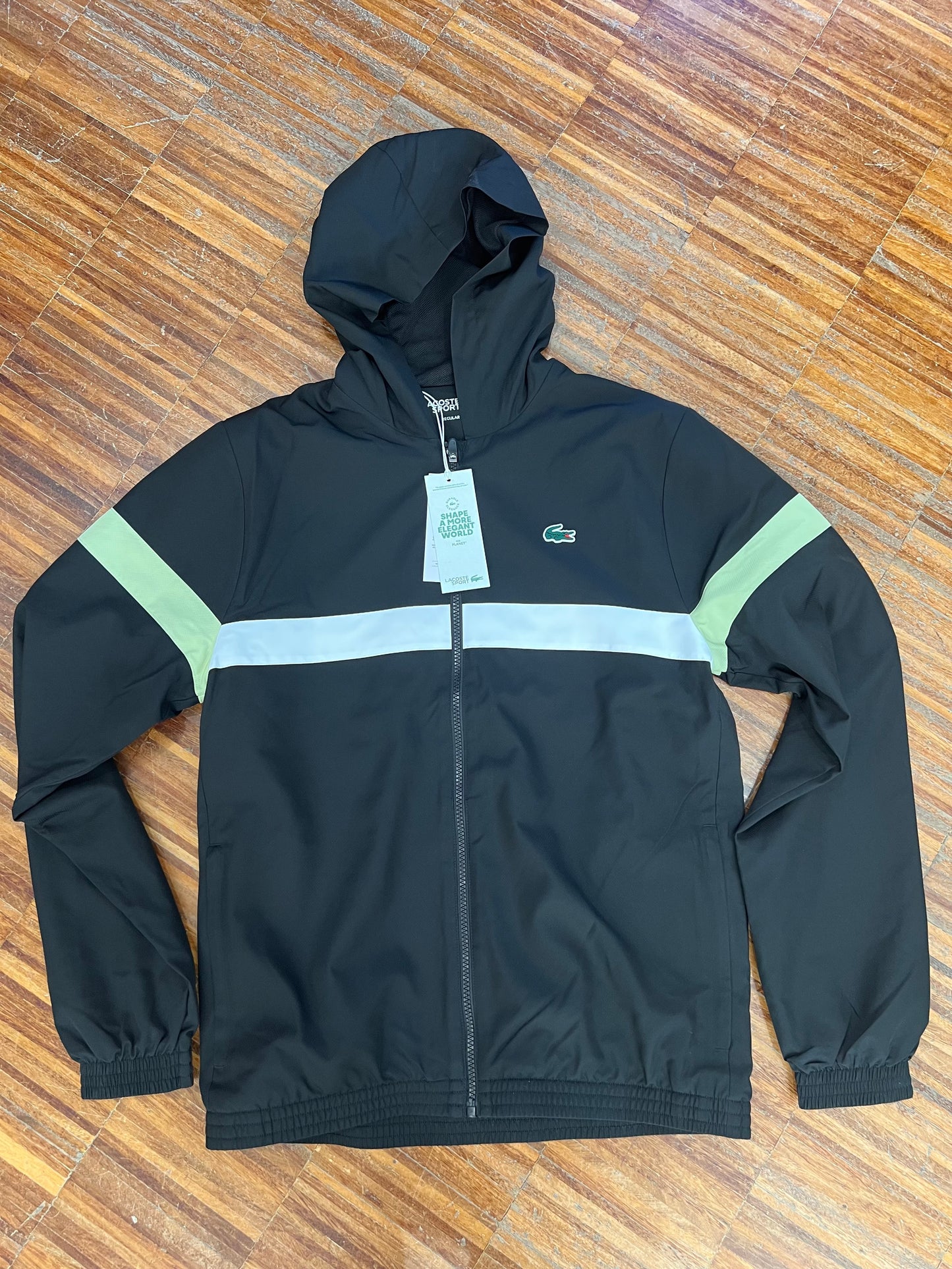 tuta Lacoste microfibra