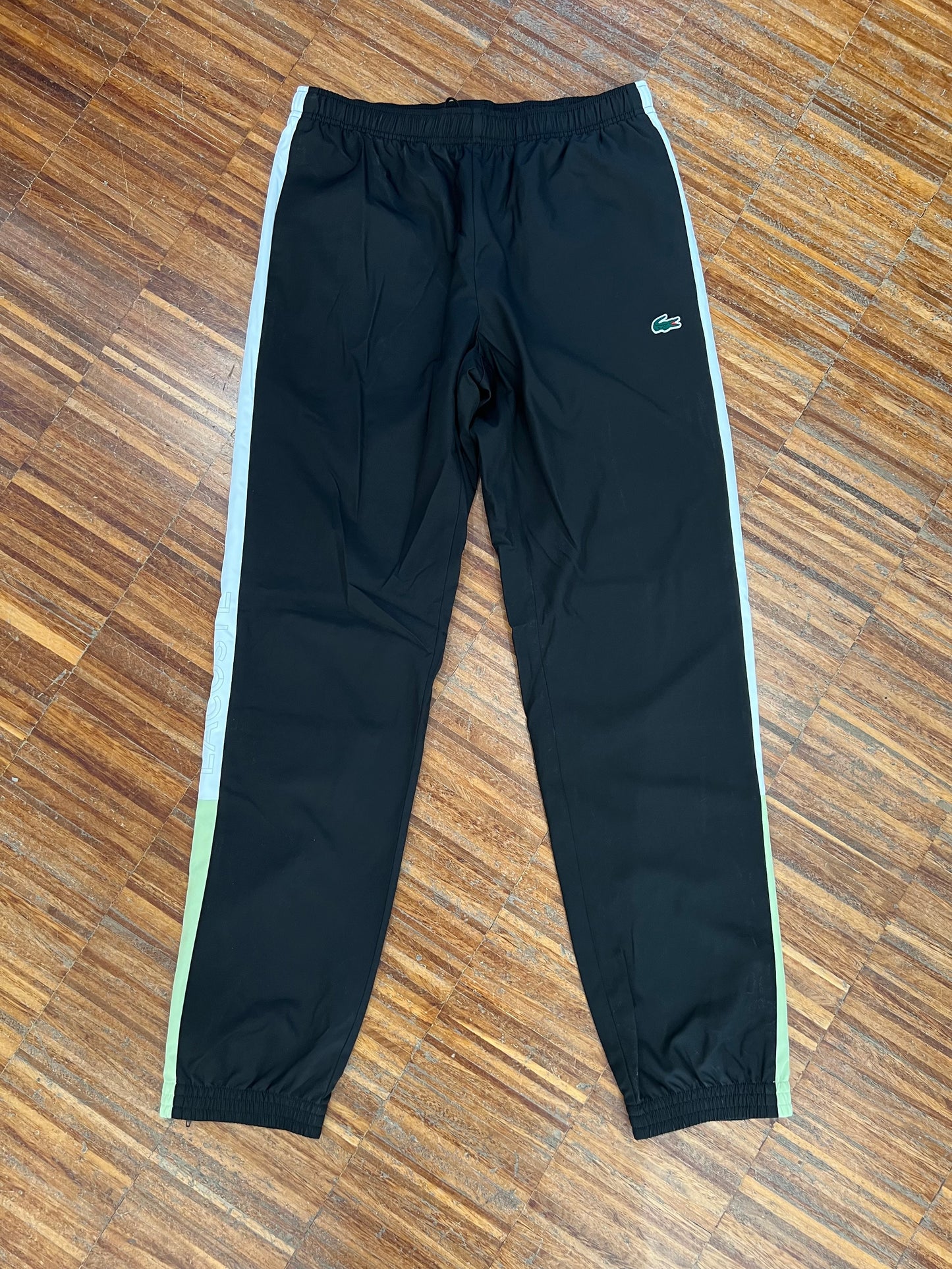 tuta Lacoste microfibra