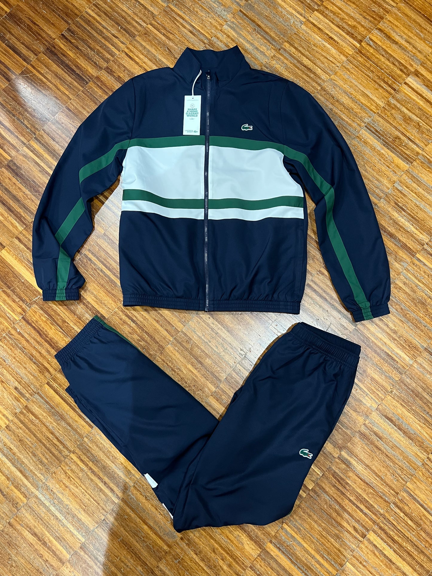 tuta Lacoste microfibra