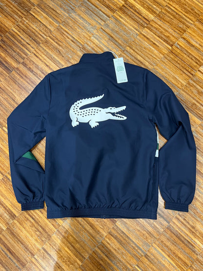 tuta Lacoste microfibra