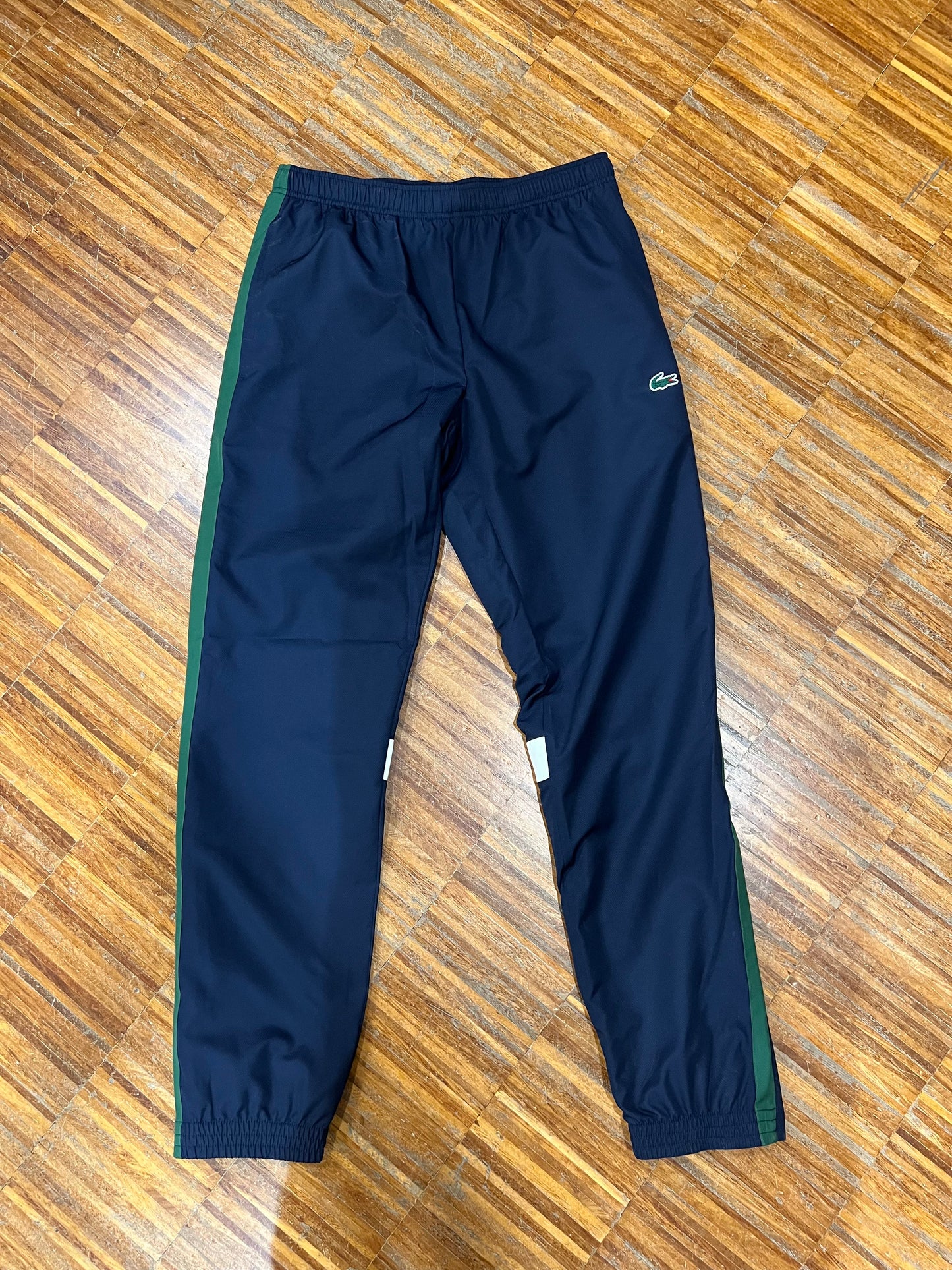 tuta Lacoste microfibra